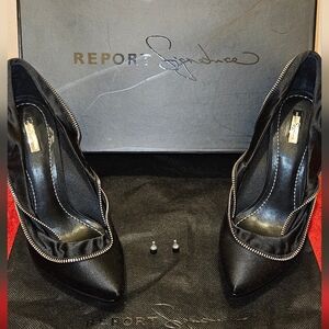 Report Signature black with cool zipper accents. Very comfortable.